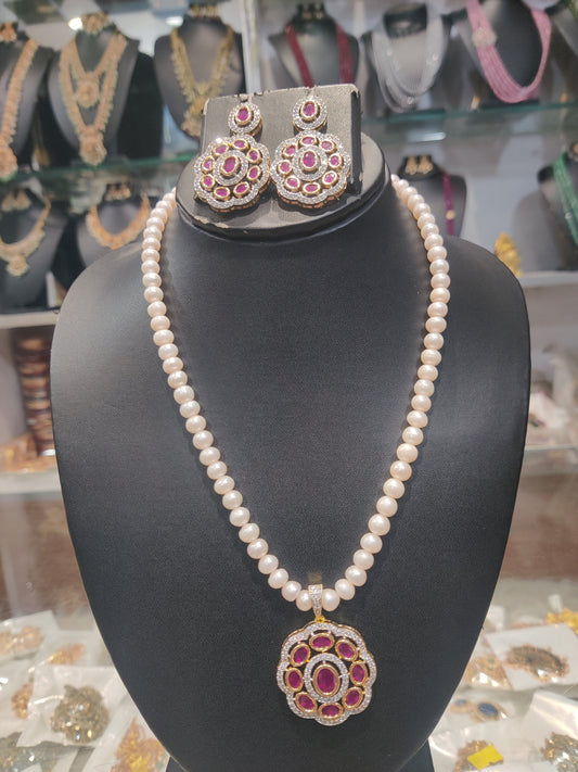 "Pearls "single line pearls with locket set rubys with "cz"stones