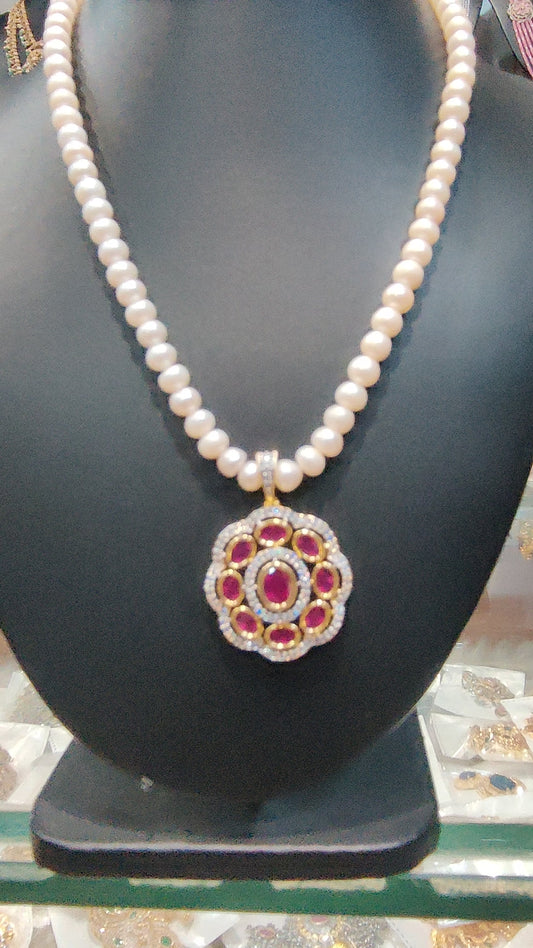 "Pearls "single line pearls with locket set rubys with "cz"stones
